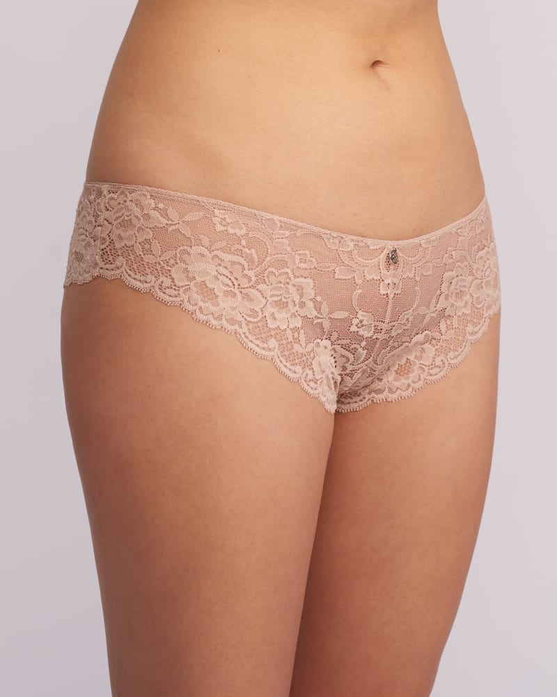 Front of a model wearing a size XL Brandy Brazilian Panty in Sand by Montelle. | dia_product_style_image_id:184933